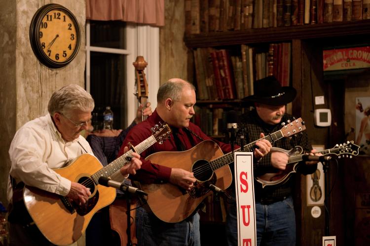 Ken Scoggins and Millers Creek perform during the Sutton Ole Time Music Hour at the T.B. Sutton General Store in Granville, TN.