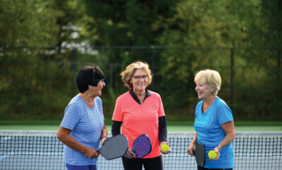 Senior women at a tennis court. Active seniors living a healthy lifestyle. Staying active in retirement.